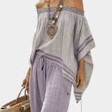 Csíkos bambusz felső, nyitott vállakkal és széles nadrágokkal az elegáns és friss stílusért